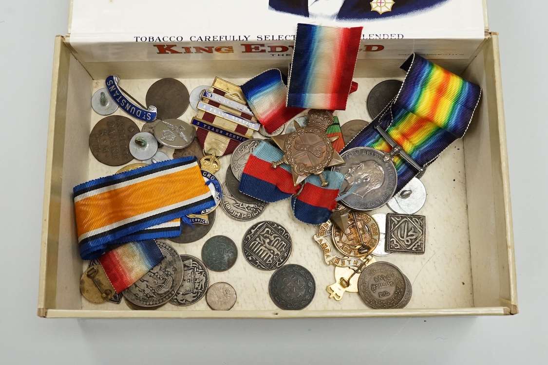 A First World War medal trio to Crl. J.E. Shelton R.E., together with a WWII 1939 to 1945 star, a British Red Cross long service medal, plus a few mainly Far Eastern and Indian coins, etc.